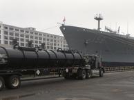 5,500 gallon capacity, 2 compartment vacuum trailer at shipyard